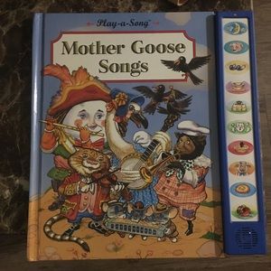 Mother goose songs play a long book. Great shape but needs batteries
